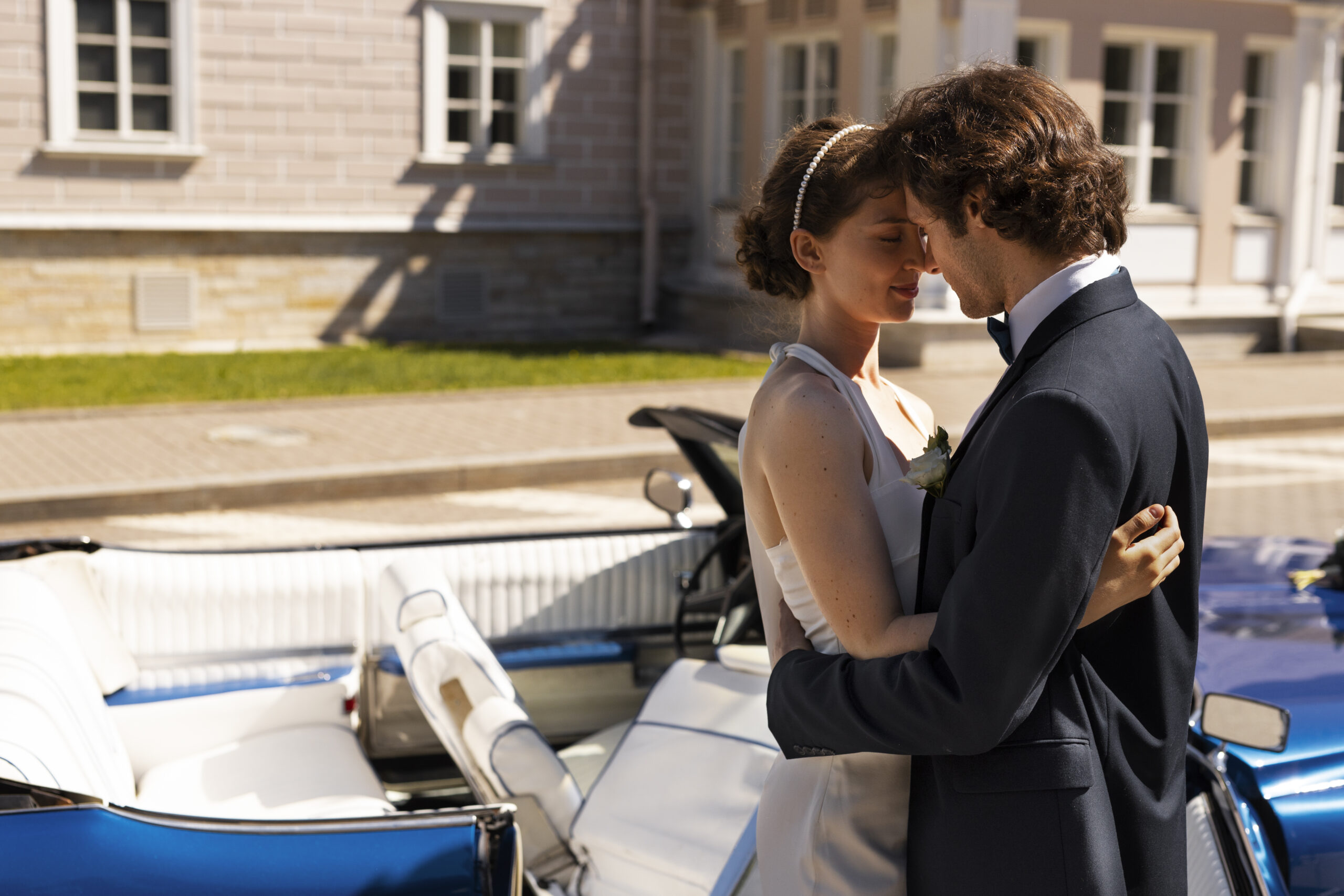 side-view-romantic-married-couple-near-car.jpg